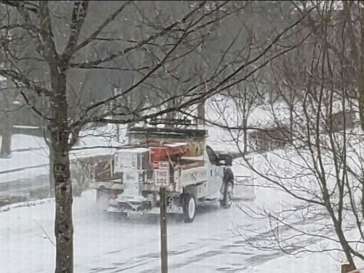 This is a photo of a snowplow plowing in the City of Snoqualmie.