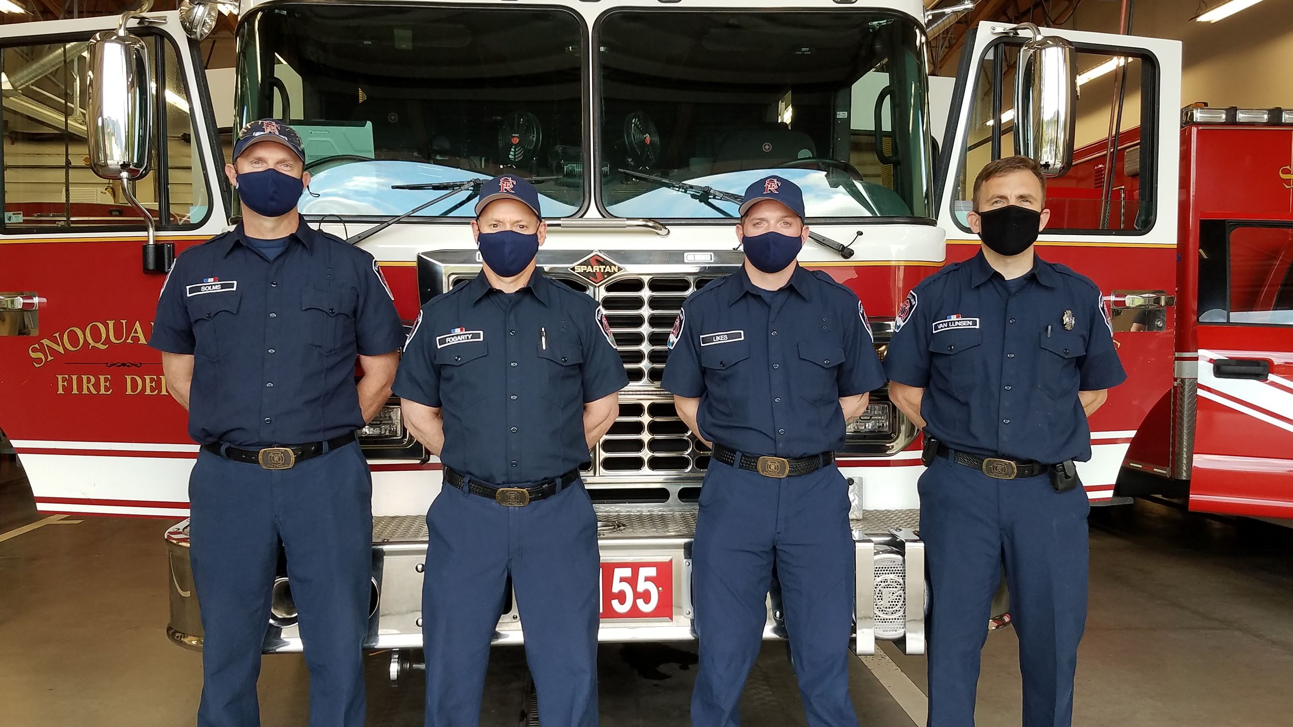 Volunteer Firefighters John Solms, Don Fogarty, and John Paul Likes and Firefighter Peter van Lunsen