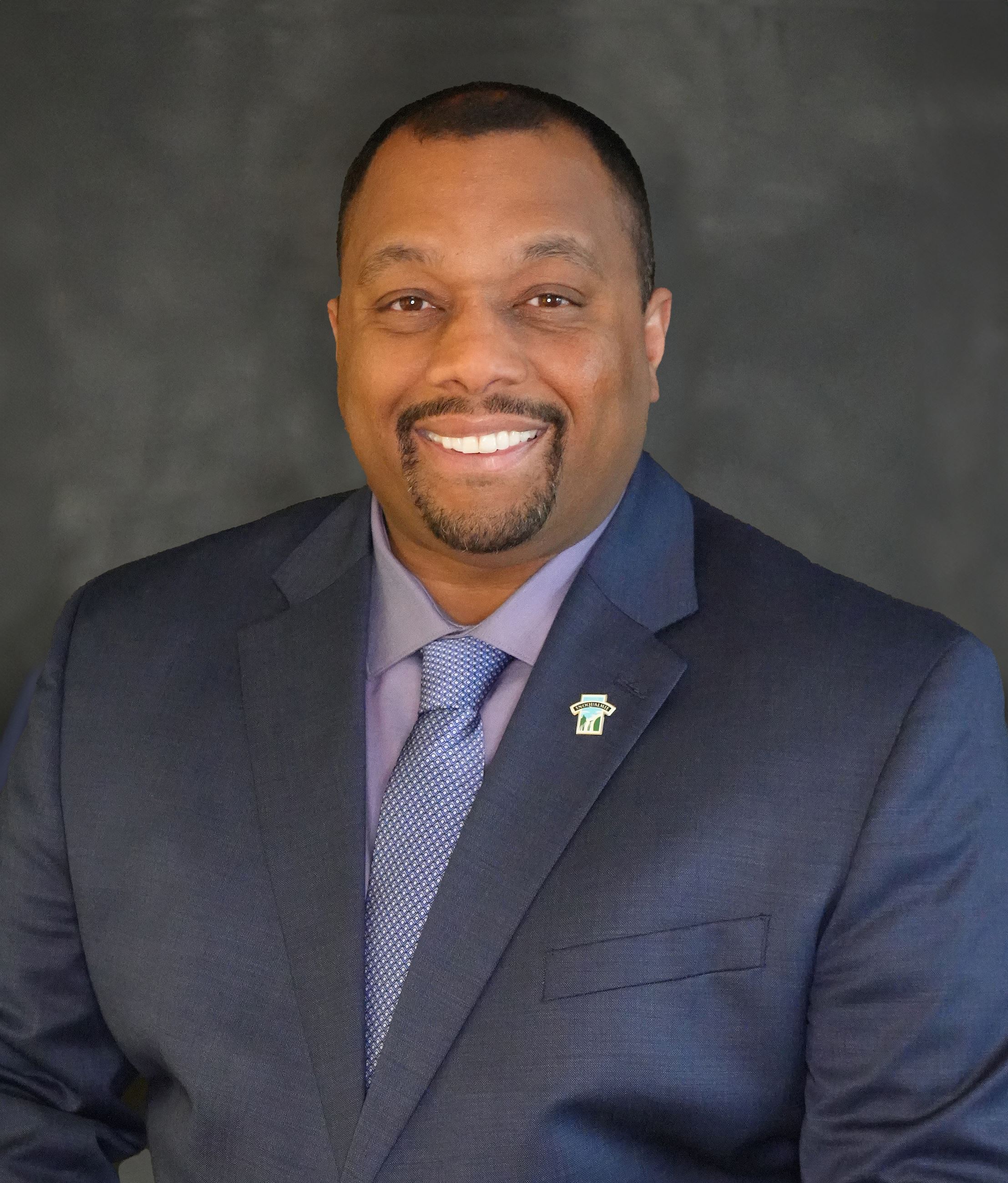 CM Washington Headshot_Gray backdrop_RETOUCH 1-2-24